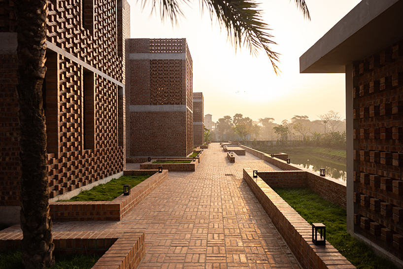 brick walls and perforated jali screens enclose training hub by codec in coastal bangladesh