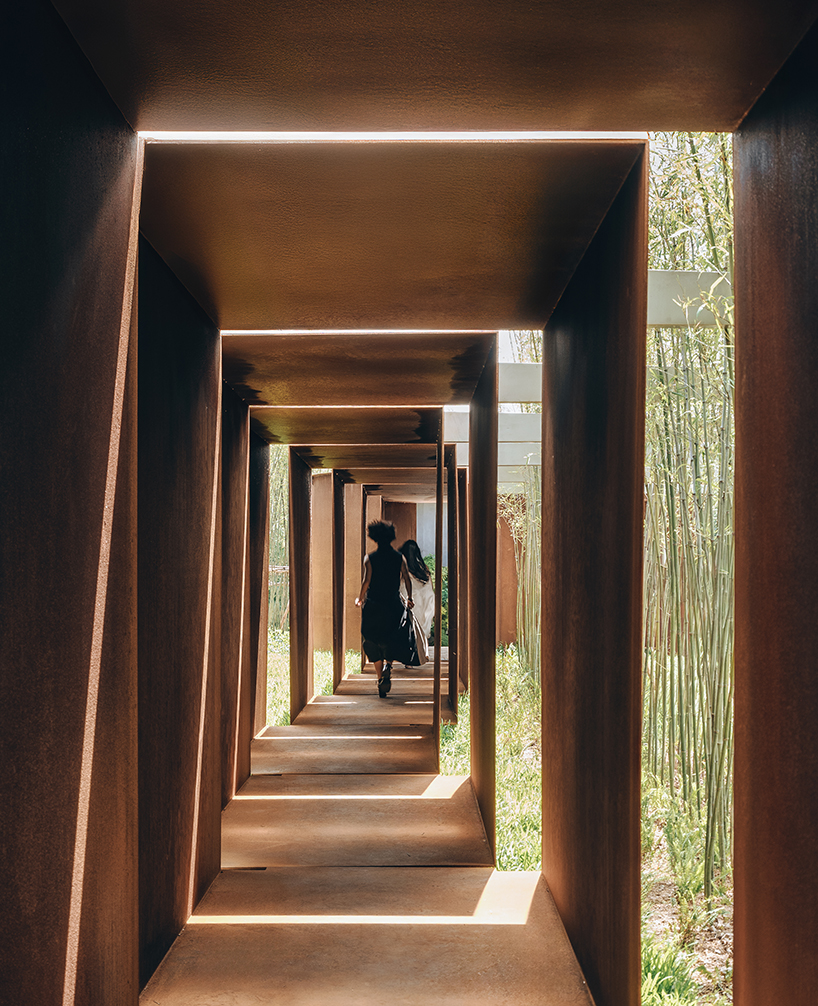 rhythmic steel pavilion by DL atelier weaves through riverfront bamboo grove in china