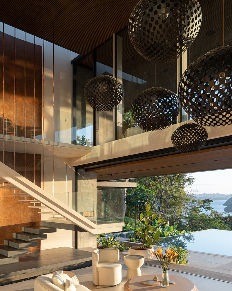 cantilevered planes of QBO3 arquitectos' casa yume frame tropical views in costa rica