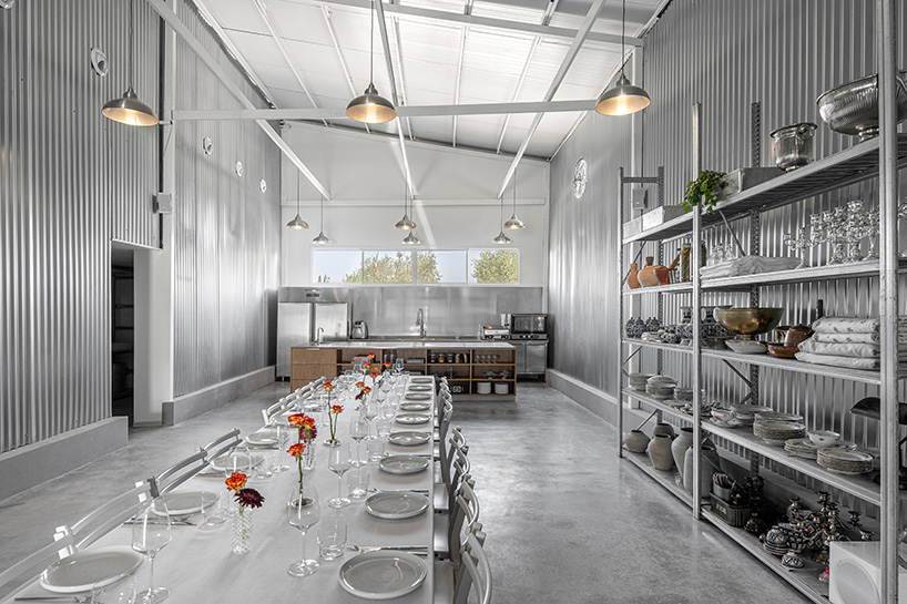corrugated metal interiors reinvent vegetable storage fridge into industrial hospitality space