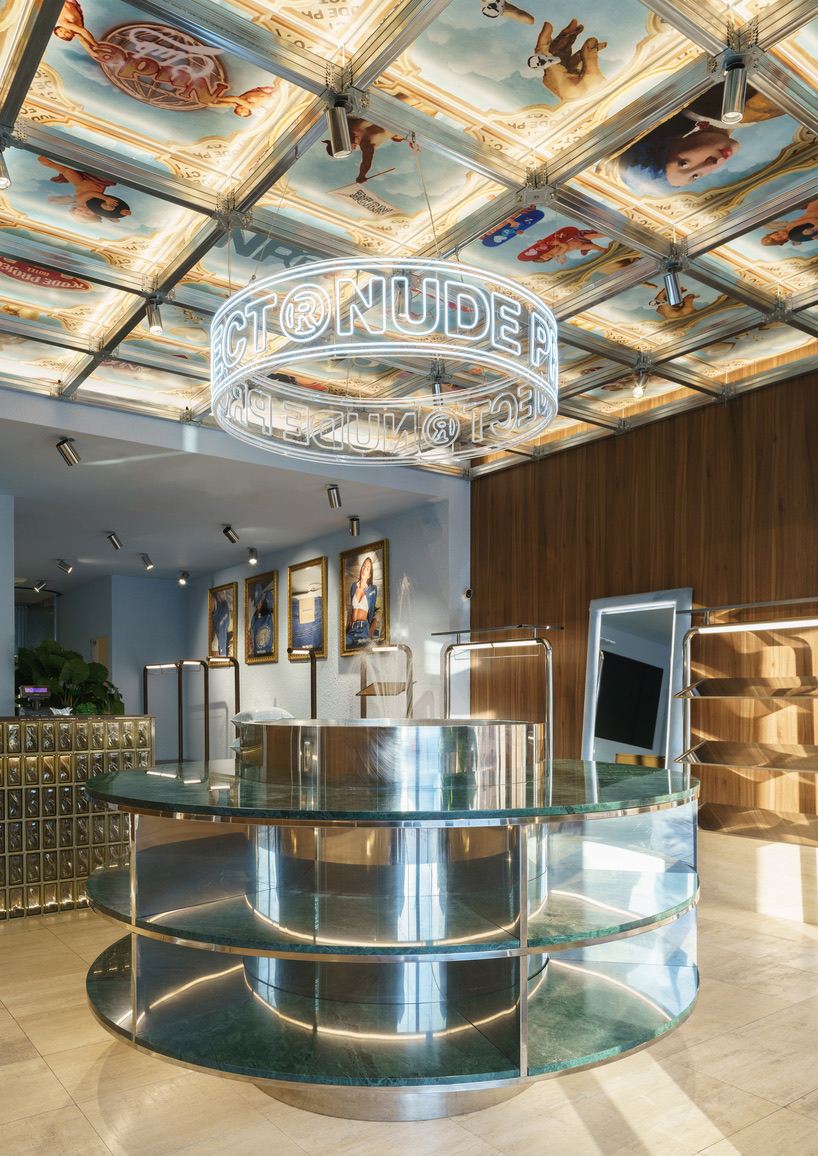 faux coffered ceiling displays famous artworks in milan flagship store by  el departamento