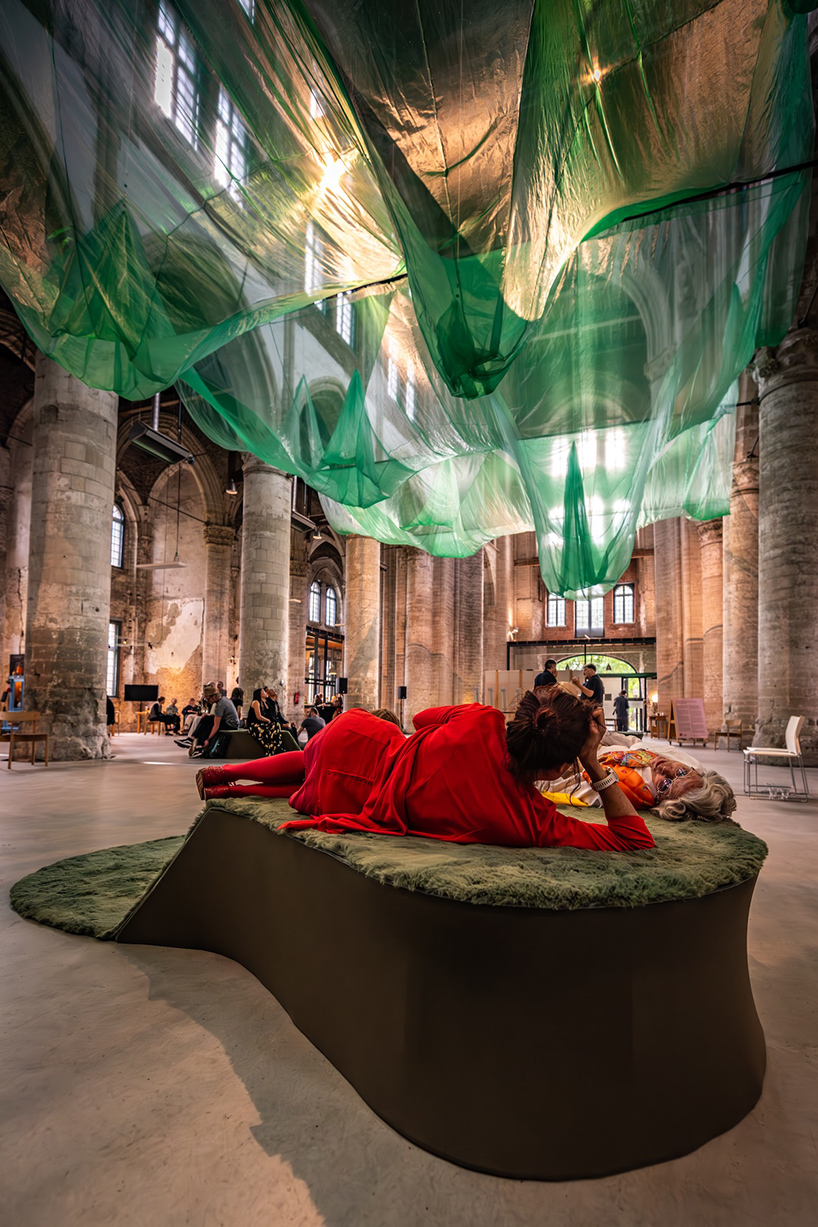 fabric and sound art installations evoke underwater landscape within gothic dutch church