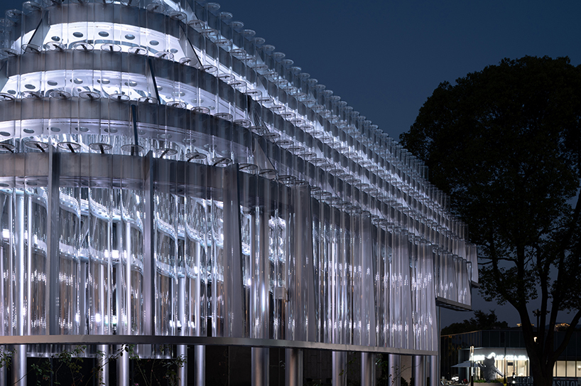 five stacks of glass tubes construct arc-shaped pavilion lucida by deep origin lab in china