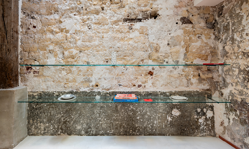 red bricks line the refreshment club's kiln-inspired flagship for parisian porcelain house 