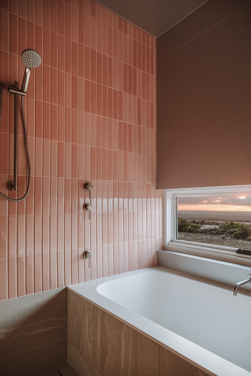 off-grid holiday pod fuses eco-conscious features with modern luxury in australia's west bay