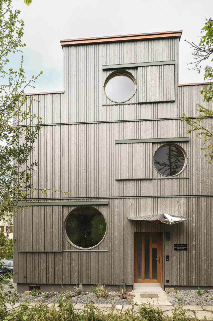 rounded openings and programmed 3D relief punctuate studio anna jach's wooden home extension in zurich