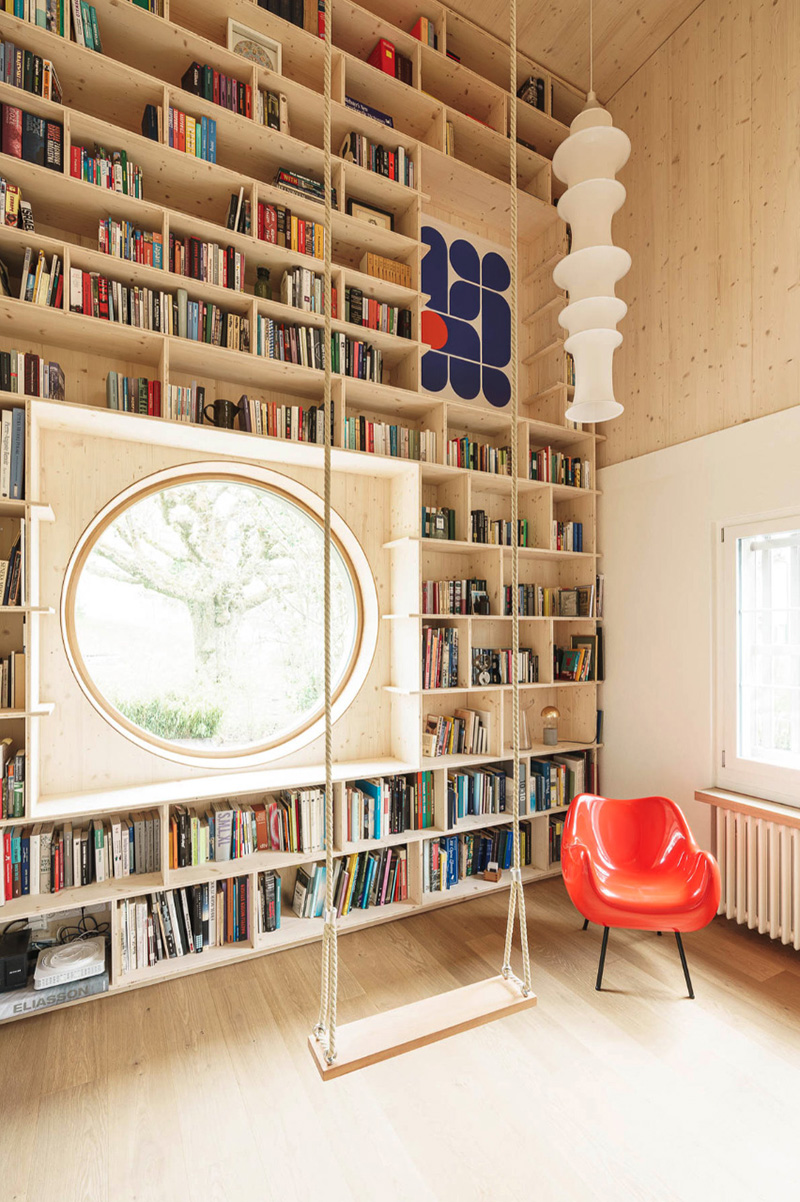 rounded openings and programmed 3D relief punctuate studio anna jach's wooden home extension in zurich