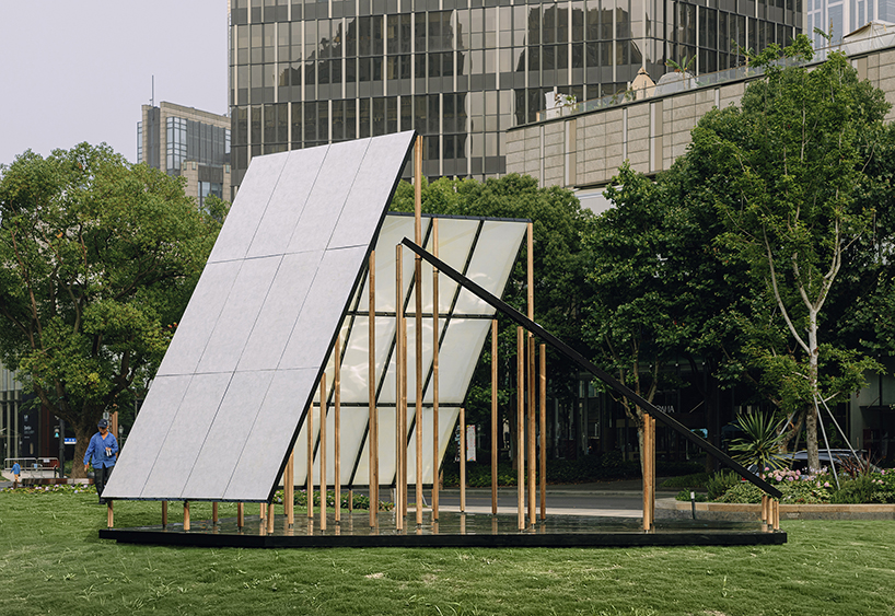 translucent panels of galaxy arch's installation cast warm glow across park in china