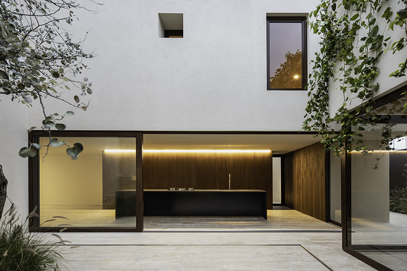 three hermetic volumes fuse shaping sabino 10's solid exterior in mexico