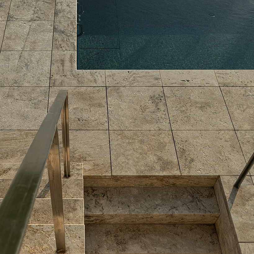 reflective aluminum framework crowns the clifftop house by KONTEXTUS in hungary