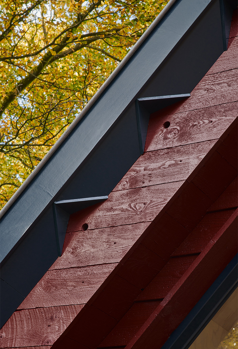 diagonally cut A-frame roof revives dutch holiday home by kumiki