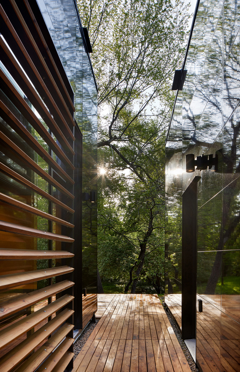 black reflective recyclable cladding coats pinkney neighborhood house in kansas