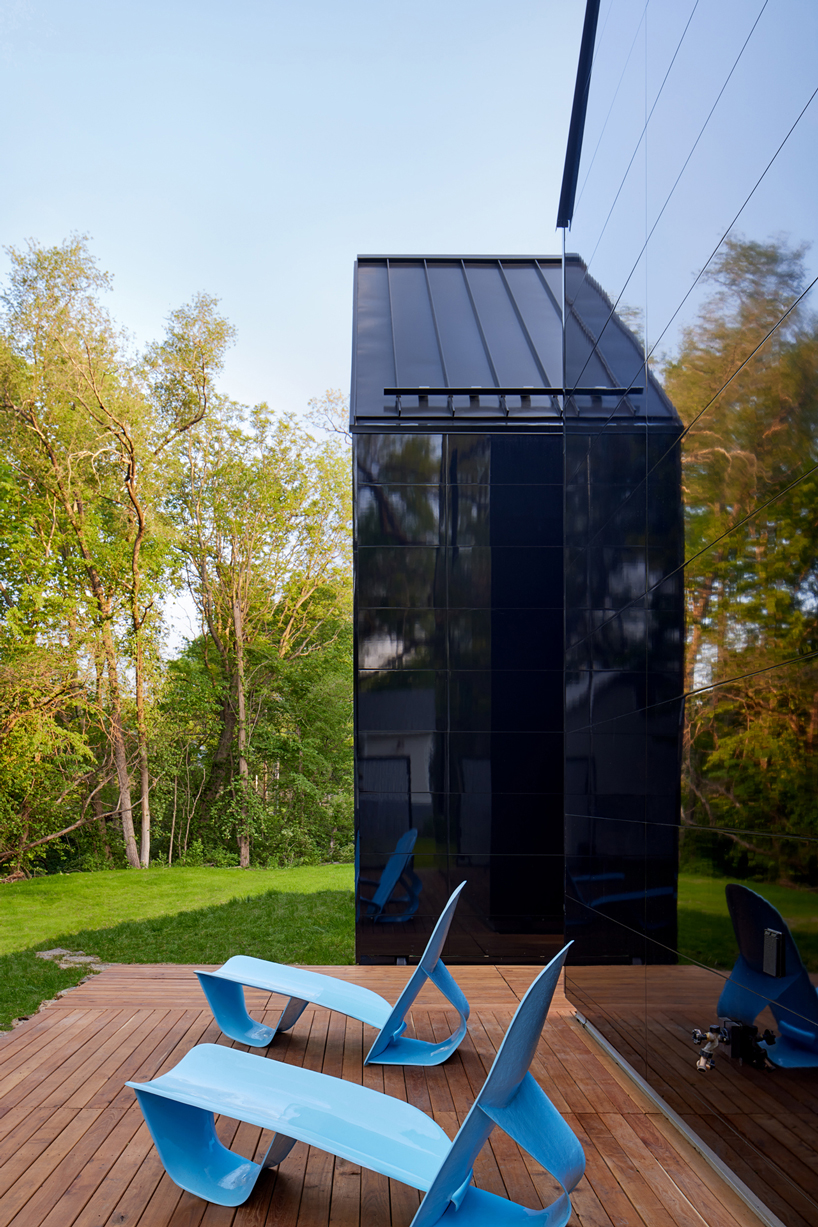 black reflective recyclable cladding coats pinkney neighborhood house in kansas