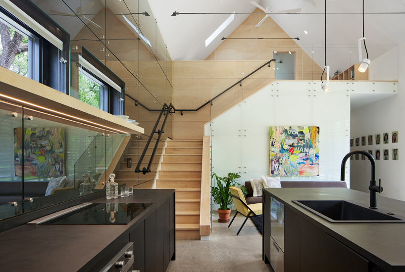 black reflective recyclable cladding coats pinkney neighborhood house in kansas