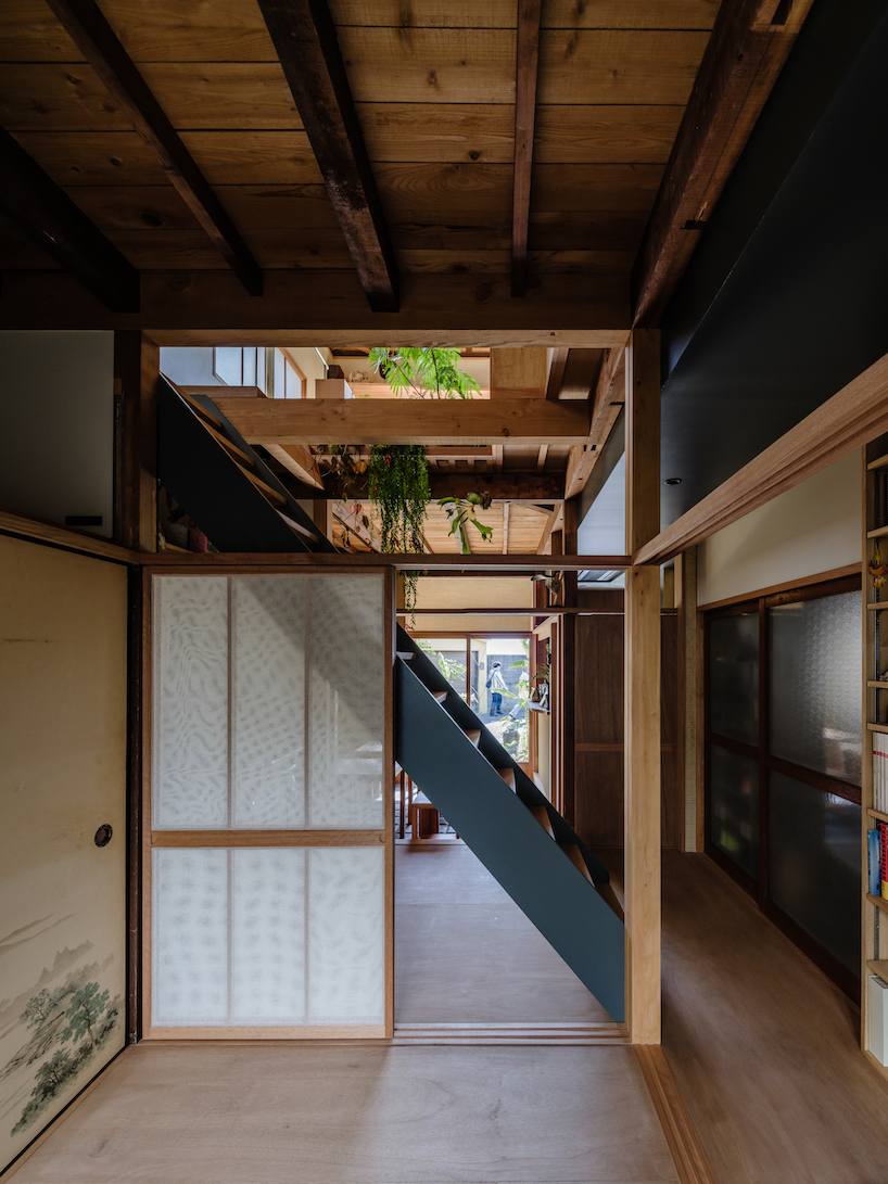 mixed-use wooden house showcases traditional japanese and global influences