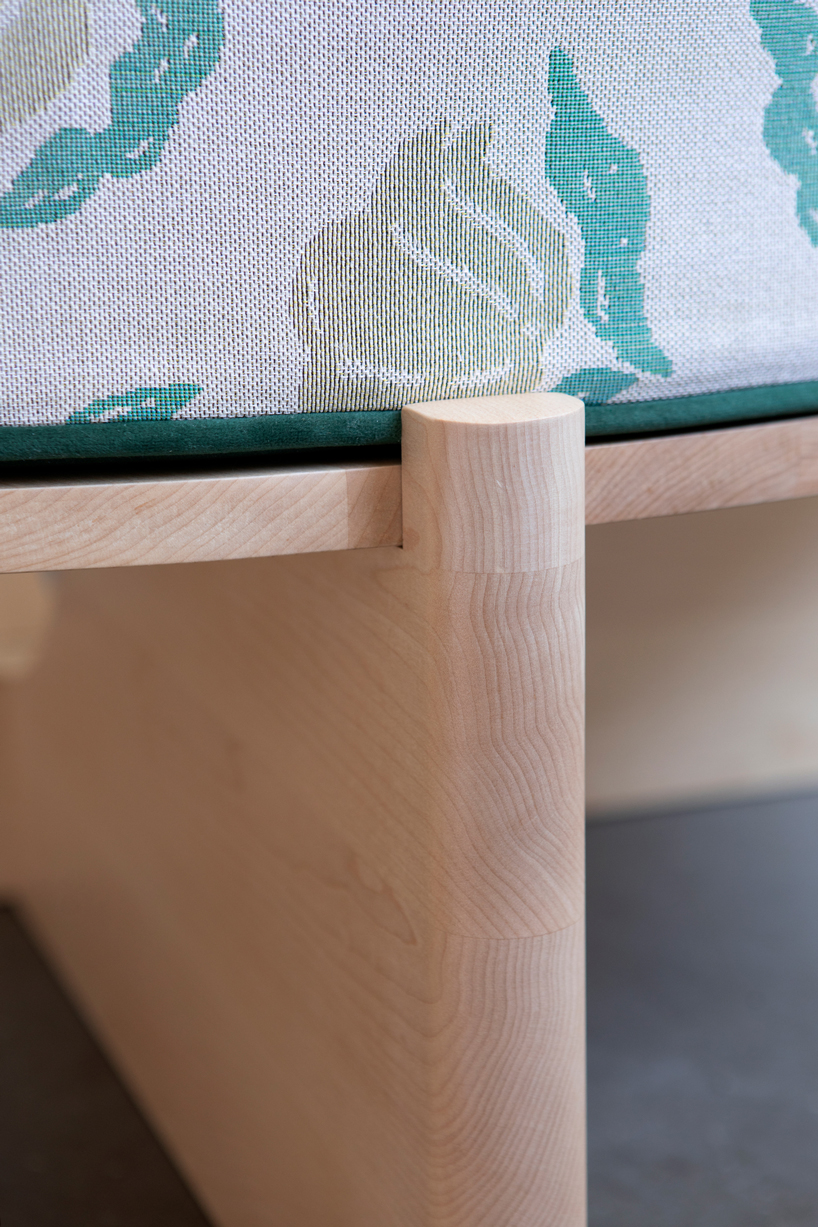 studio nama and frill furniture explore organic relationship between solid maple wood and textiles