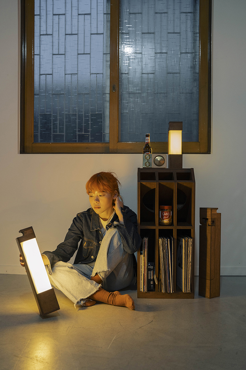 portable lamp modules integrate into furniture for compact living