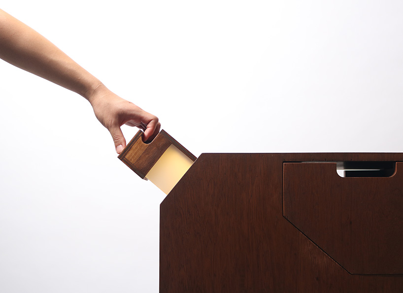 storable and portable 'SAI' lamp modules integrate into furniture for compact living