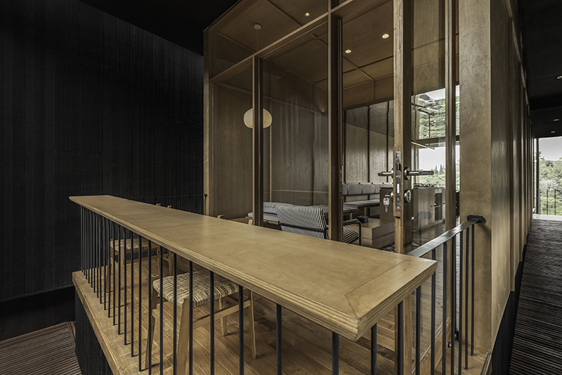 dark monolithic angular volumes shape jae haala villa in indonesia