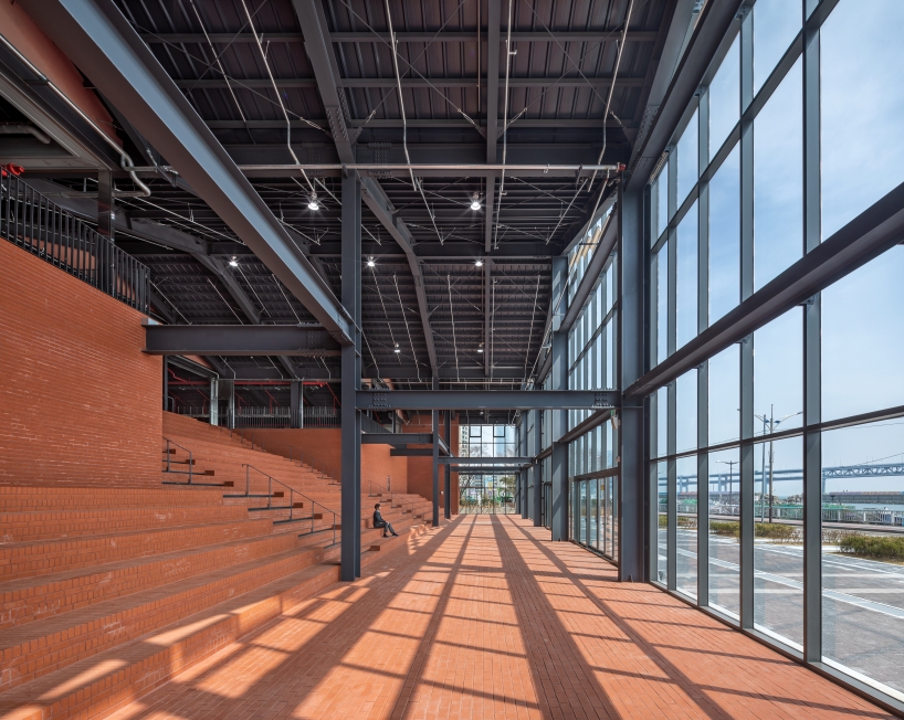 red brick and steel framework composes millac the market in south korea