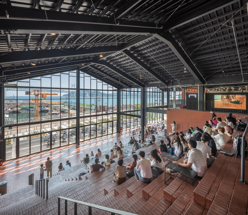 red brick and steel framework composes millac the market in south korea