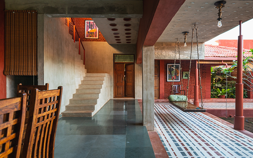 linear brick-laid court organizes weekend home in india reinterpreting 'nalukettu' typology