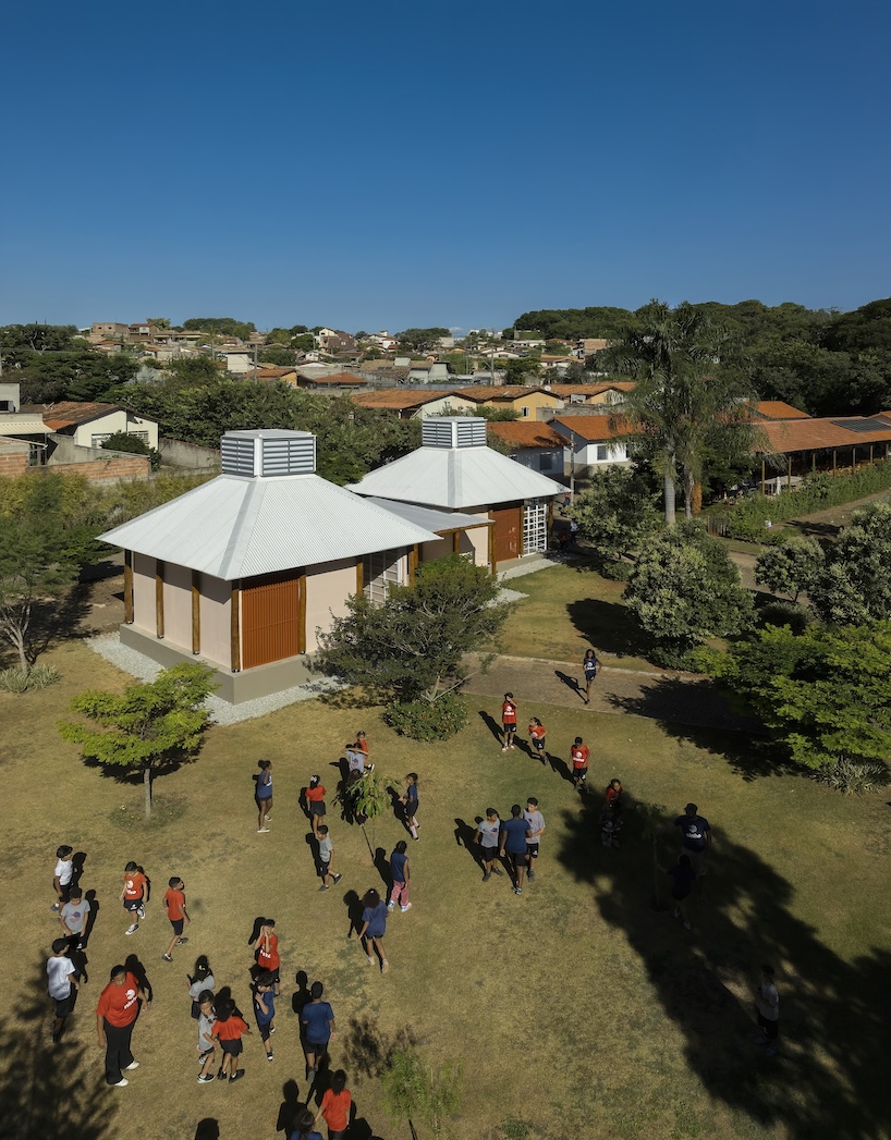 Children learning outdoors at an ecological school in Brazil