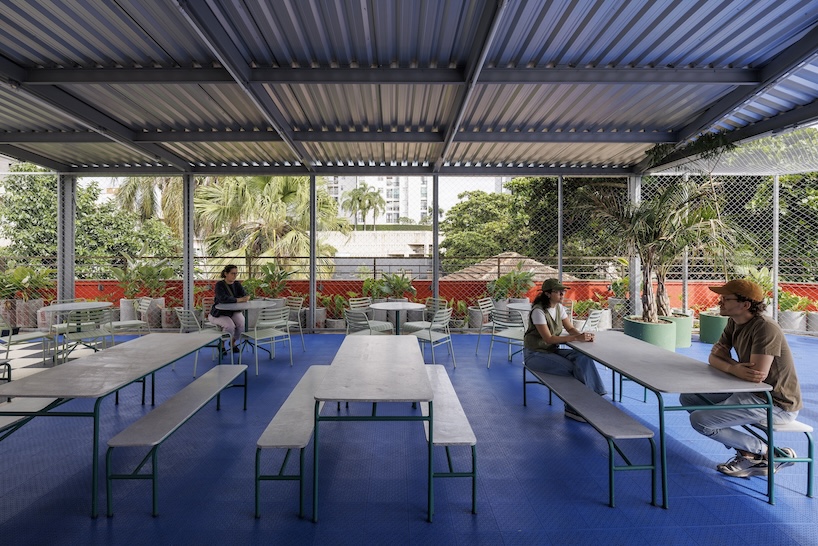 former bank in brazil transforms into vibrant magnum lourdes college by biri + chico albano