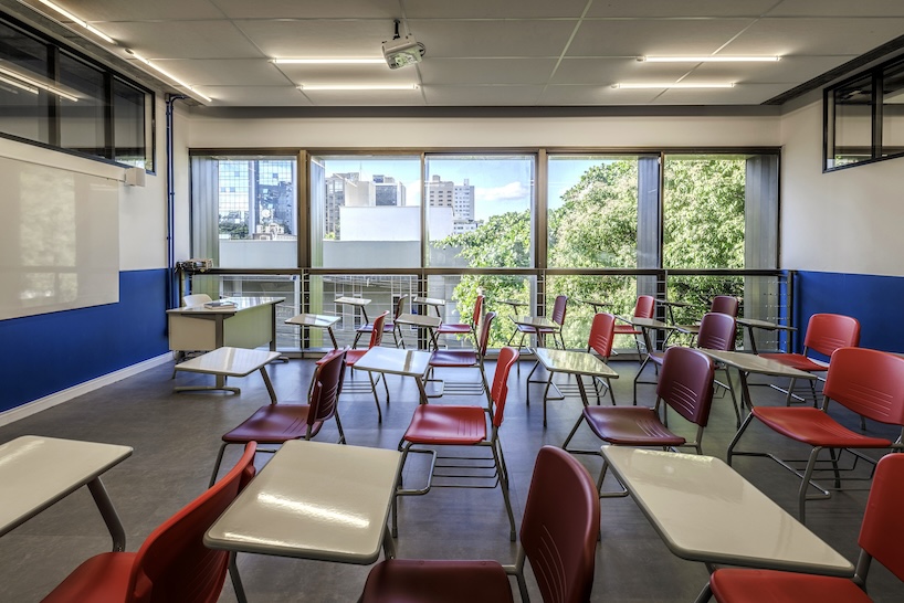 former bank in brazil transforms into vibrant magnum lourdes college by biri + chico albano