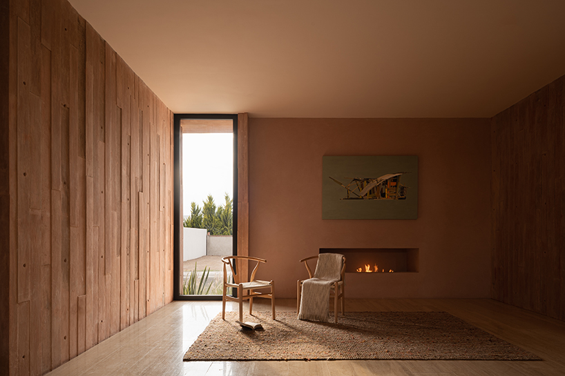 jorge garibay completes a brutalist residence in queretaro with pink board concrete volumes 