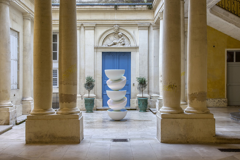 vicente spínola's totem installation stacks reflective semi-spheres, pondering the climate crisis