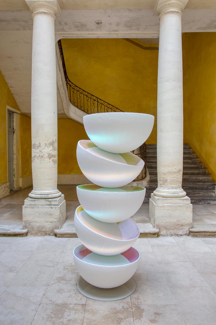 vicente spínola's totem installation stacks reflective semi-spheres, pondering the climate crisis