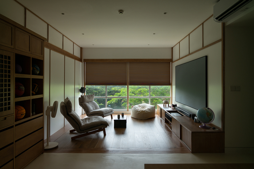 H3D7 apartment in vietnam sets up a wooden framework shaping multifunctional rooms