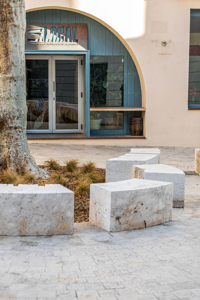 carved travertine transforms paving, furniture, and planting across spanish historic old town - 8