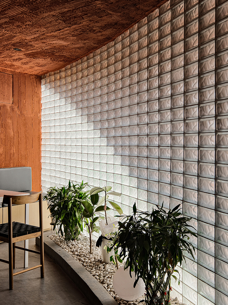 Concrete coffee shop with terracotta shades 27 coffee reuses the old medical laboratory in Indonesia