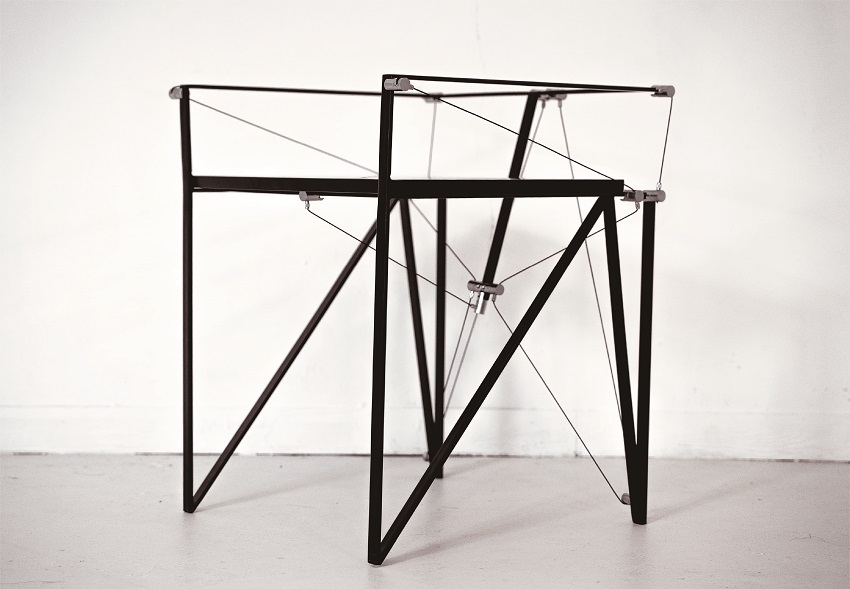furniture series explores tension and balance through sleek austere aesthetics