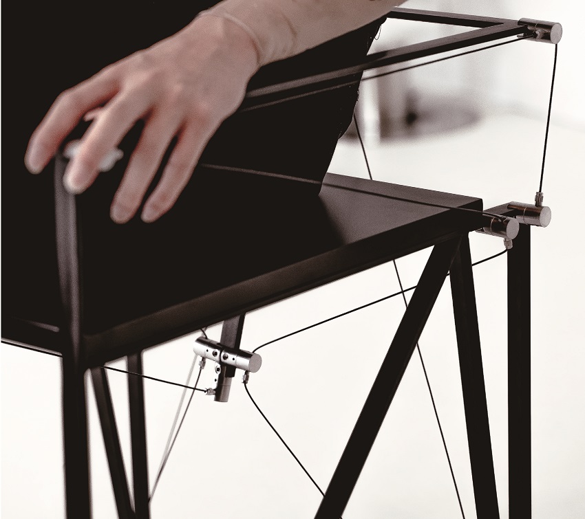 furniture series explores tension and balance through sleek austere aesthetics