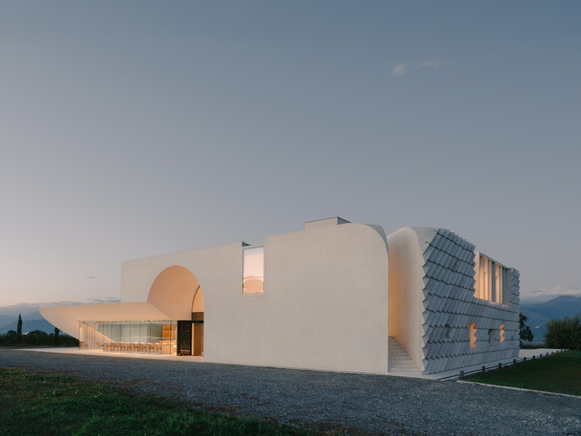 arches and voids carve winery&rsquo;s monolithic white facade in georgia