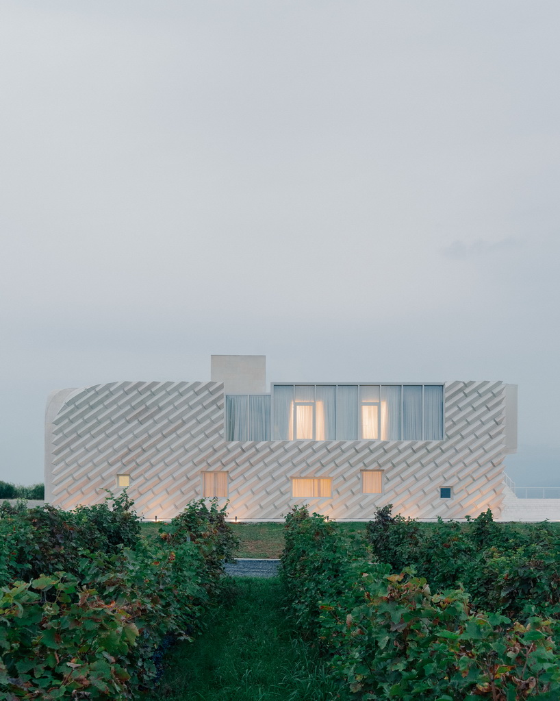 arches and voids carve winery&rsquo;s monolithic white facade in georgia