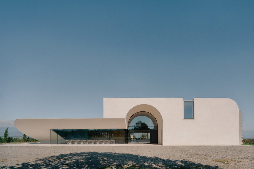 arches and voids carve winery&rsquo;s monolithic white facade in georgia