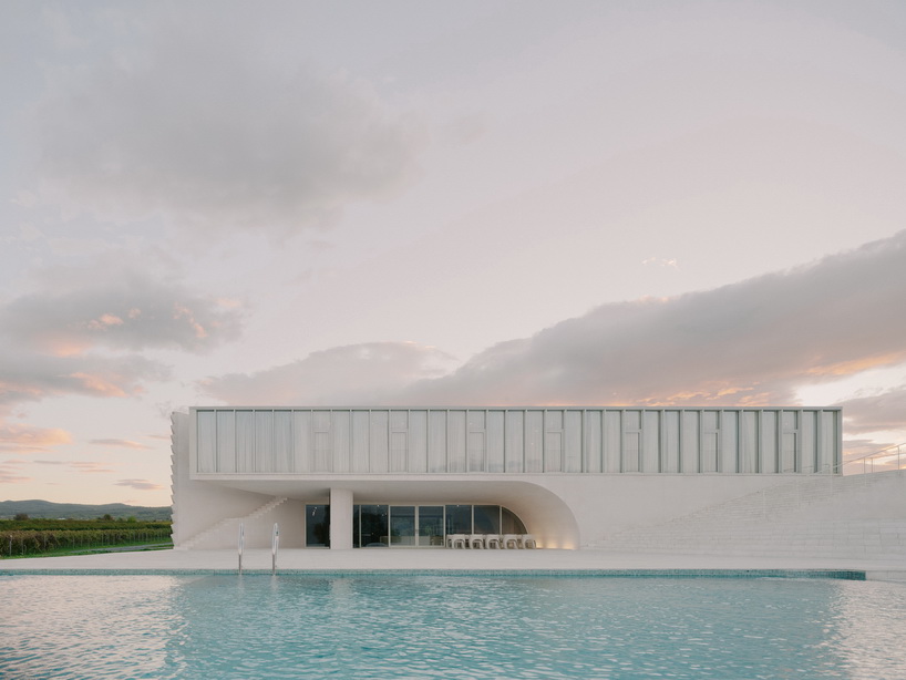 arches and voids carve winery&rsquo;s monolithic white facade in georgia
