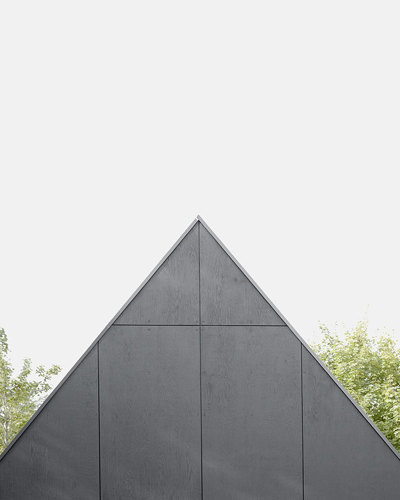 primary colors imbue the wooden A-frame house wolin in poland