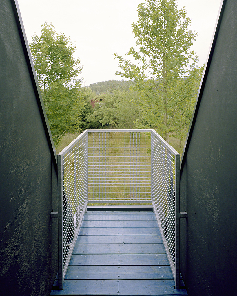 primary colors imbue the wooden A-frame house wolin in poland