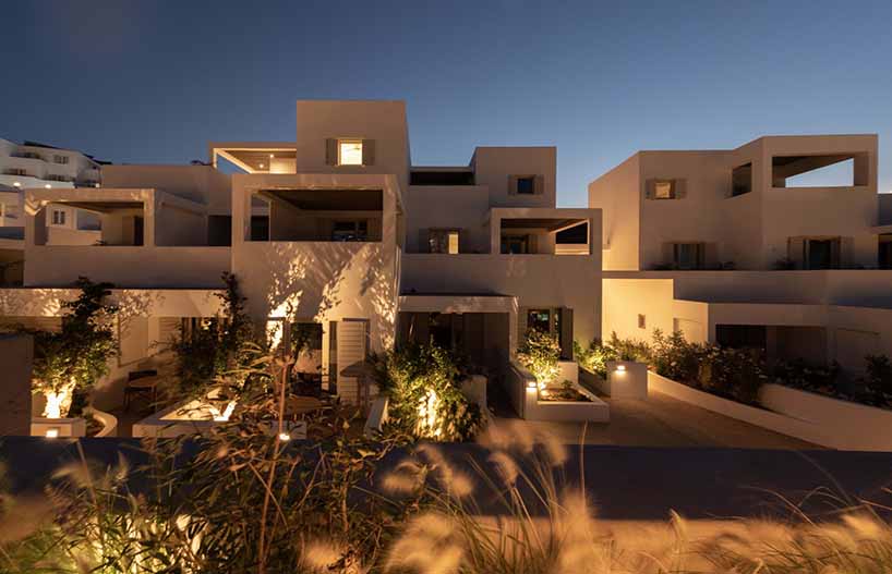cubic and circular volumes develop around resort's swimming pool in greece