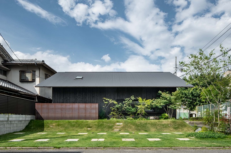 dark baked cedar planks shield gabled yamaguchicho house in japan