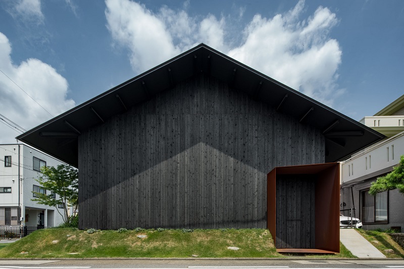 dark baked cedar planks shield gabled yamaguchicho house in japan