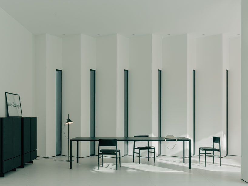 serrated charred wood shell encloses suburban residence on the hills of tbilisi