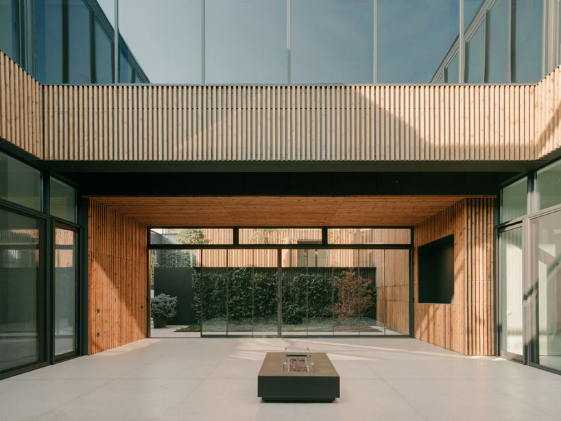 serrated charred wood shell encloses suburban residence on the hills of tbilisi