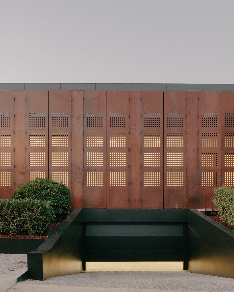 punctured iron doors shape kinetic facade by TIMM architecture in tbilisi - 4