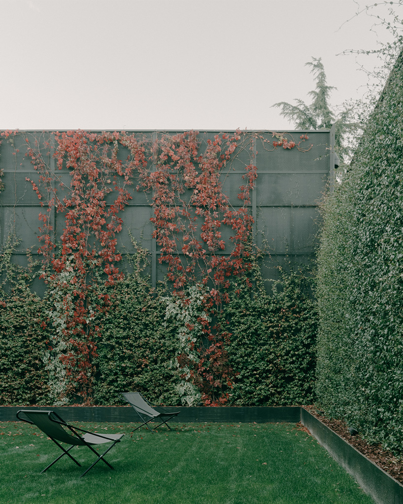 punctured iron doors shape kinetic facade by TIMM architecture in tbilisi - 7